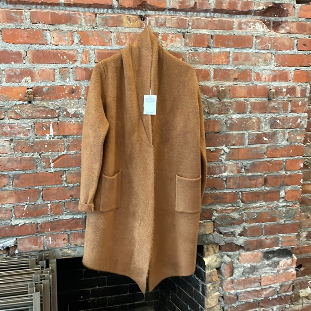 Brand new long sweater by Pink Martini.